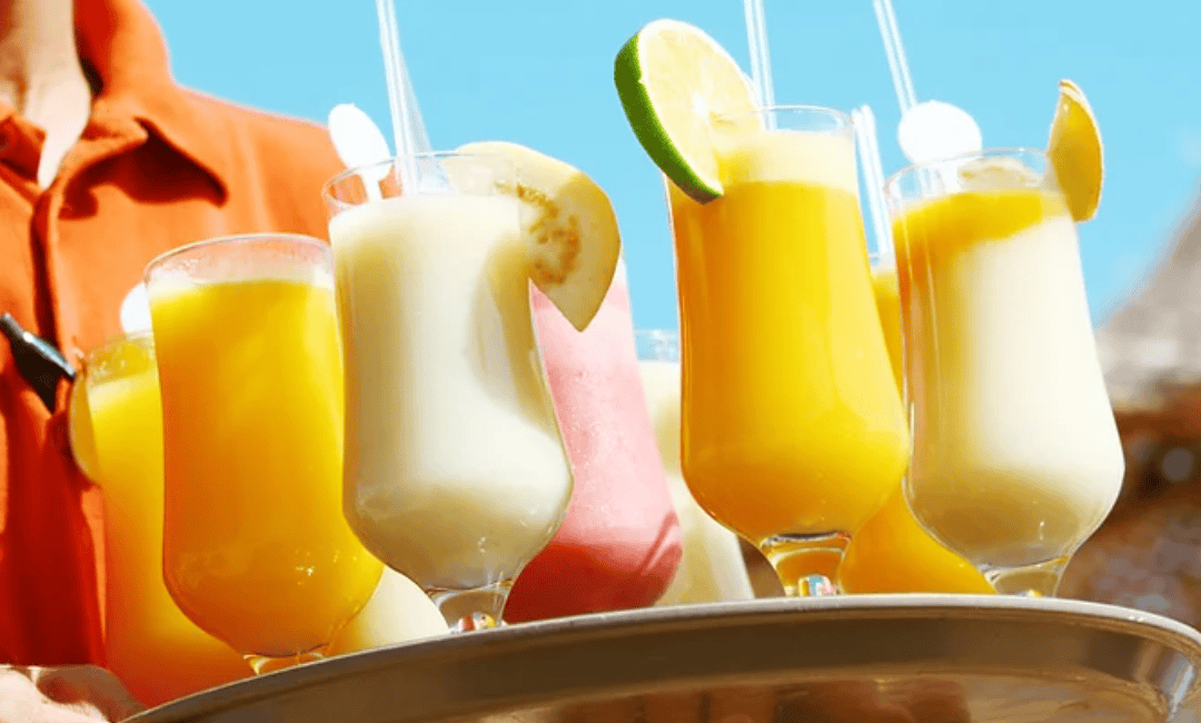 Frozen drinks on a tray at an all-inclusive resort