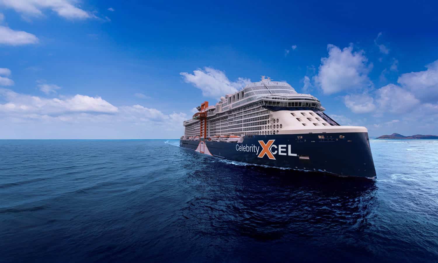 A large cruise ship named Celebrity Xcel sails on calm blue ocean water under a partly cloudy sky.
